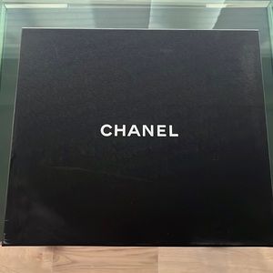 Used Twice. Chanel Box includes a chanel apparel.